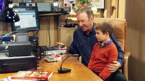 Picture of Tim Allen's character and child at ham station